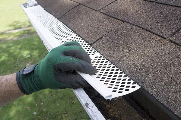 gutter guards can help to prolong the lifespan and improve the functionality of gutters by preventing clogs and water damage